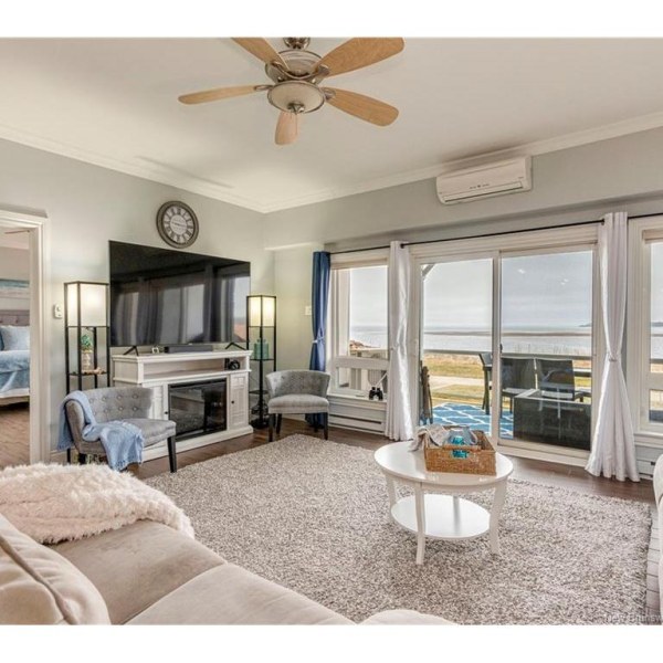 Living room framed by unobstructed ocean views